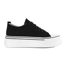 Zapatillas de mujer negras con suela gruesa. negro