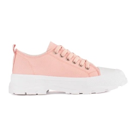 Zapatillas clásicas en la plataforma rosa claro rosado