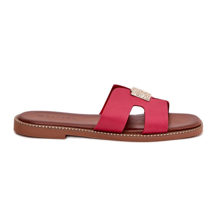 Chanclas planas con recortes y un adorno de fucsia rosado