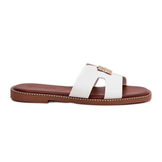 Chanclas planas con recortes y una decoración blanca blanco