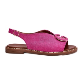 Sandalias planas con una decoración rosa rosado
