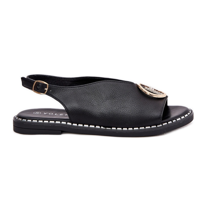Sandalias planas y elegantes con una decoración negra negro