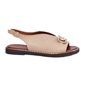 Sandalias de cañón plano con un adorno de beige de cuero ecológico