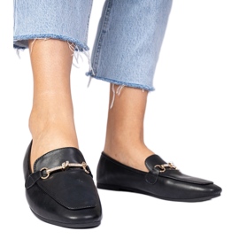 Mocasines negros con decoración dorada y circón