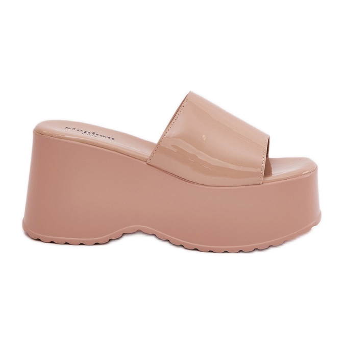 Zapatillas de mujer pintadas en la plataforma y cuñas beige