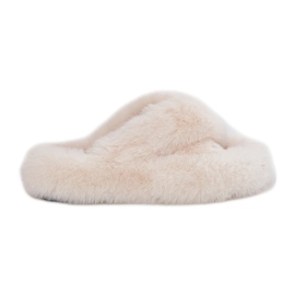 Zapatillas de piel para mujeres en un beige de luz suela gruesa