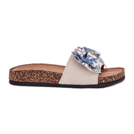 Zapatillas para mujeres con un arco en la plataforma de corcho azul beige
