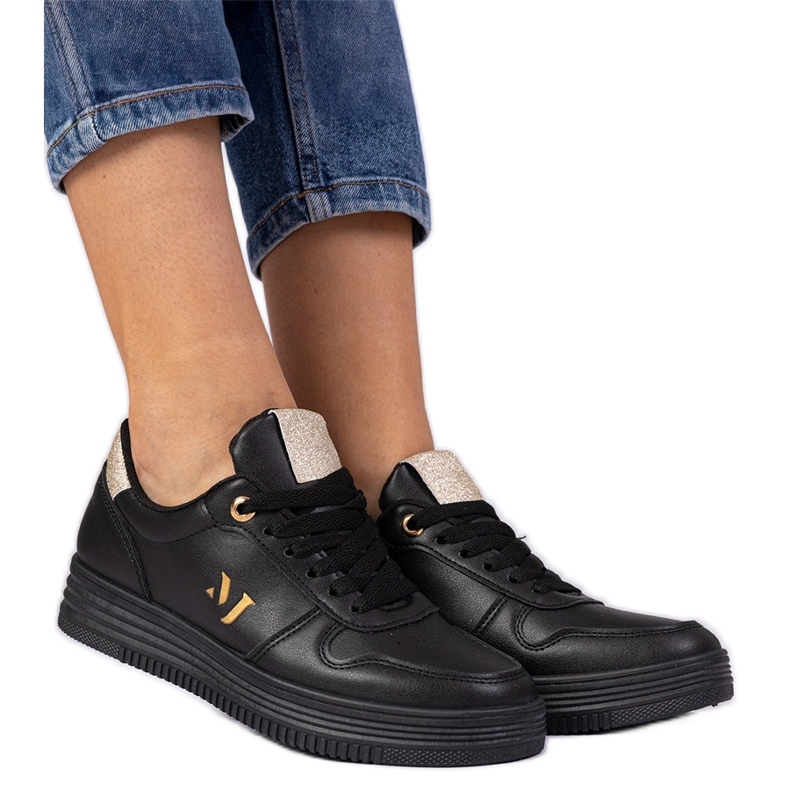 Zapatillas de deporte para mujeres negras con brillo dorado negro