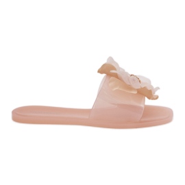 Chanclas de mujeres planas transparentes con flor desnuda artificial beige