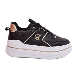 Zapatos deportivos femeninos en la plataforma negro