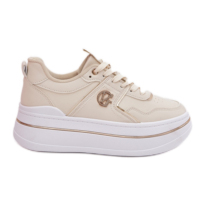 Zapatos deportivos femeninos en la plataforma beige