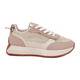 Zapatos deportivos femeninos con una malla en la plataforma beige