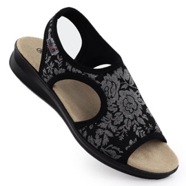 Sandalias para mujeres en una erupción flexible con flores negras Unisoft 7196 negro