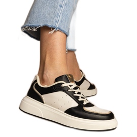Zapatillas de deporte para mujeres negras con un accesorio de brillo negro Zapatillas de deporte para mujeres negras con un accesorio de brillo negro