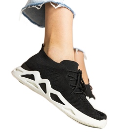 Zapatillas de deporte de mujeres negras con una parte superior de SOCKING negro