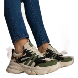 Deportes para mujeres de zapatillas verdes con brillo negro