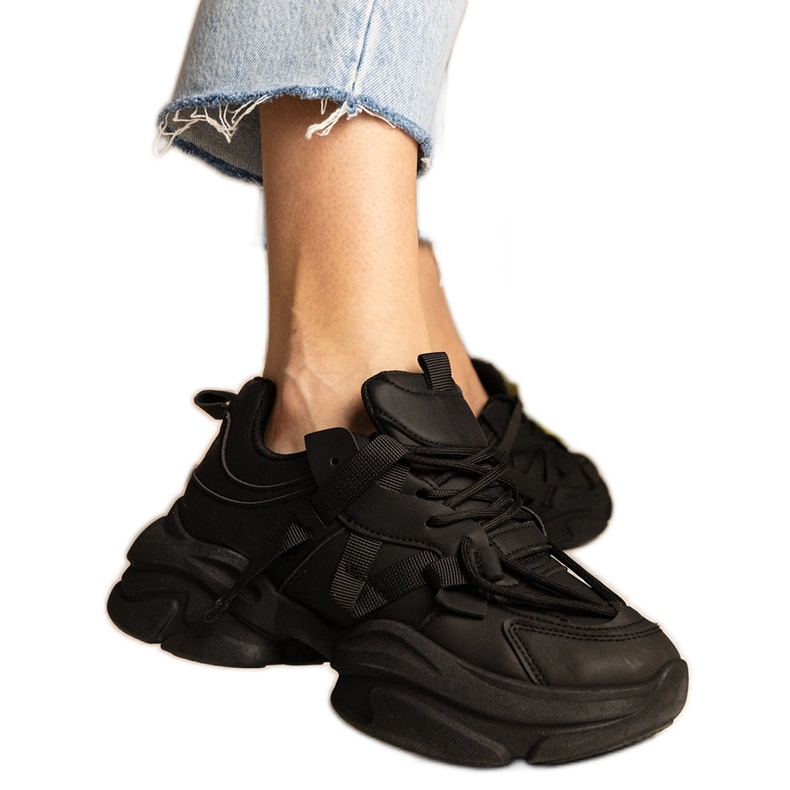 Zapatillas negras deportes masivos para mujeres negro