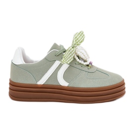 Zapatillas para mujeres en la plataforma con adornos verdes