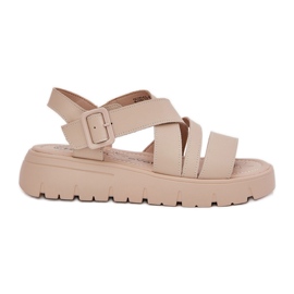 Sandalias de cuero para mujeres en la plataforma con una abrazadera beige