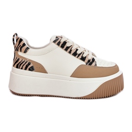 Zapatillas femeninas en una plataforma masiva beige cebra