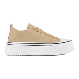 Zapatillas de mujer beige con suela gruesa.