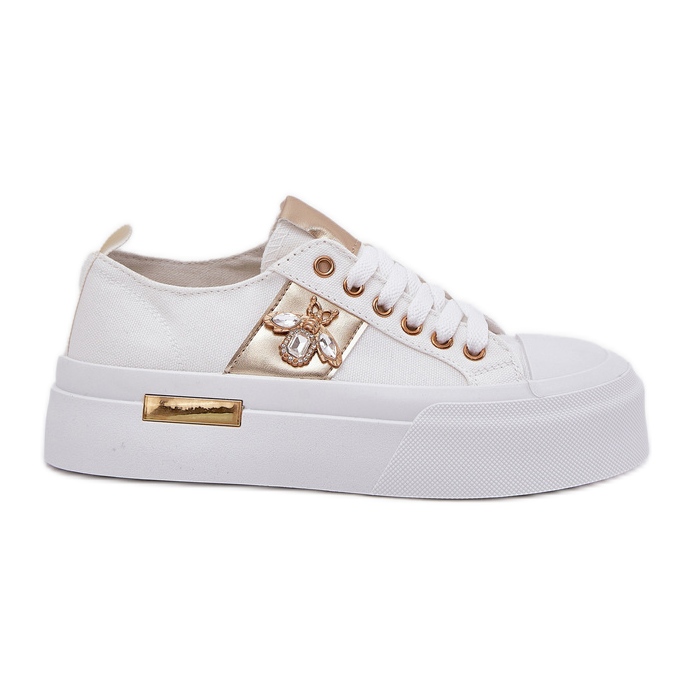 Zapatillas de deporte para mujeres en la plataforma con un detalle decorativo blanco