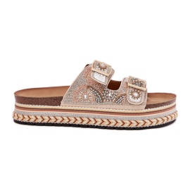Zapatillas con decoración y hebillas en la plataforma de oro dorado Zapatillas con decoración y hebillas en la plataforma de oro dorado