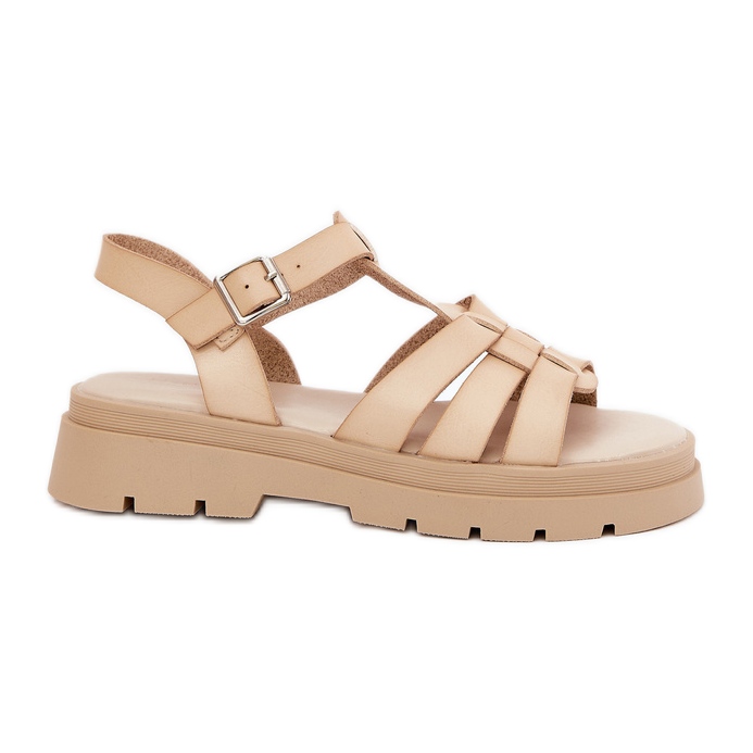 Sandalias de mujer de cuero ecológica en la plataforma beige