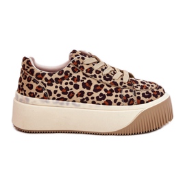 Zapatillas de deporte en una plataforma de leopardo marrón masiva
