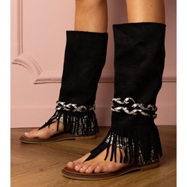 Sandalias de mujeres negras con una parte superior alta negro