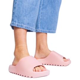 Chanclas de goma de mujeres rosas