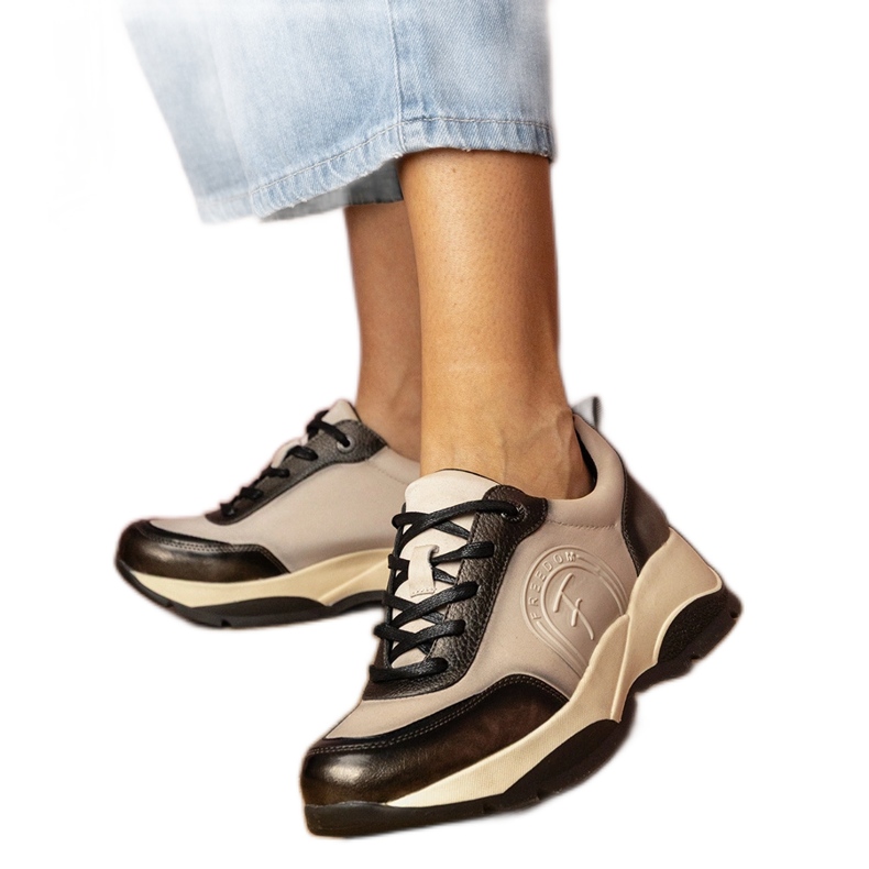 Mujeres de zapatillas de deporte de deportes grises Mujeres de zapatillas de deporte de deportes grises