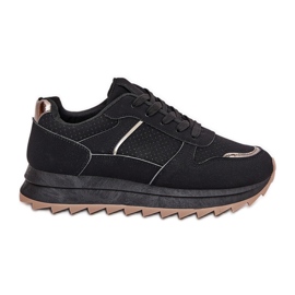 Zapatos deportivos femeninos en la plataforma negro