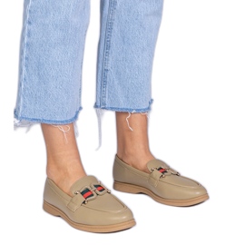 Mocasines verdes con eco -leather con un adorno Mocasines verdes con eco -leather con un adorno
