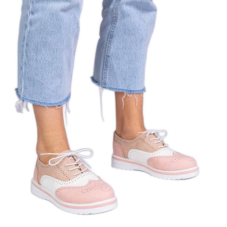 Zapatos rosa clásico de oxford rosado