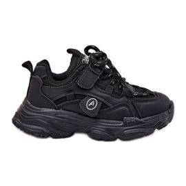 Zapatillas para niños en la plataforma negra negro
