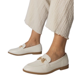 Mocasines blancos decorados con circonitas