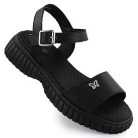 Sandalias de cuero para mujeres en una suela gruesa con un Filippo negro de mariposa DS6811