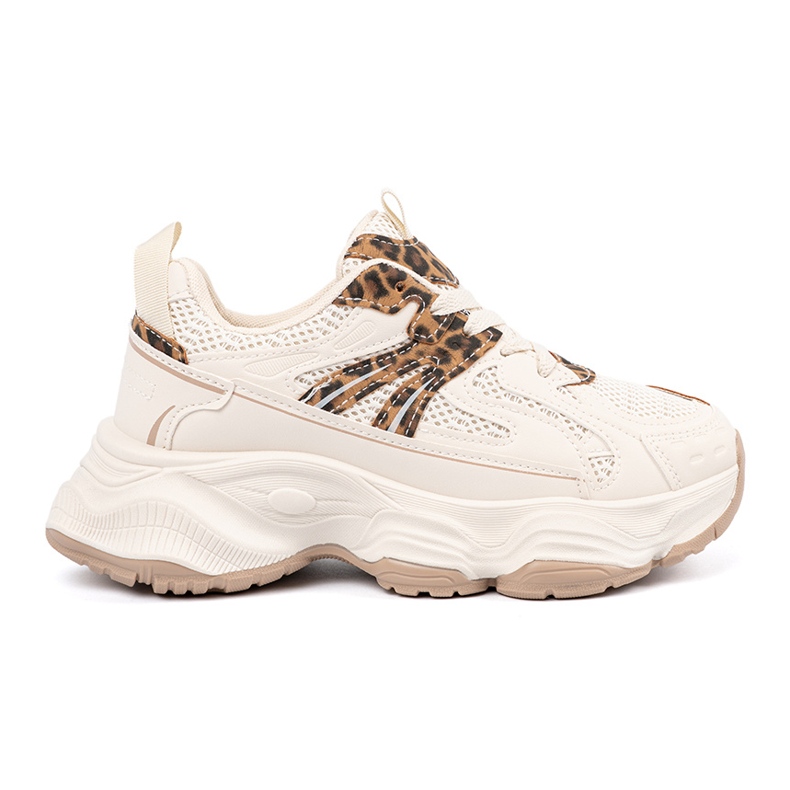 Zapatillas de deporte para mujeres en una suela de leopardo grueso beige