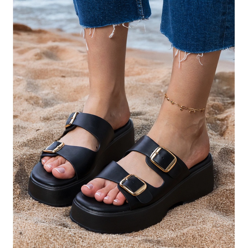 Chanclas negras con abrazaderas en rayas negro