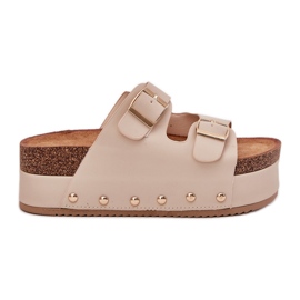 Flip folladas para mujeres con hebillas en una plataforma masiva beige