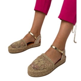 Sandalias de oro de alpargatas abiertas dorado