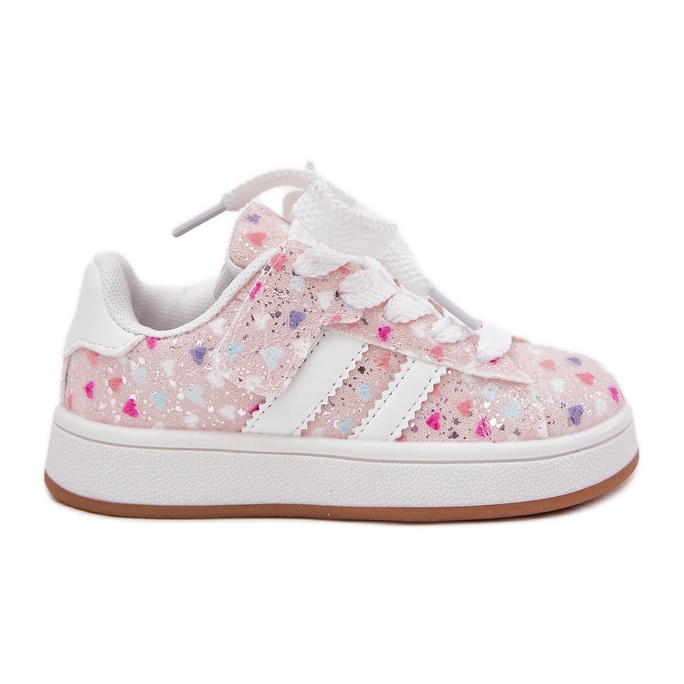 Zapatos deportivos de chicas brillantes con corazones rosados