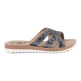 Chanclas metálicas para mujeres en una suela plana plata Chanclas metálicas para mujeres en una suela plana plata