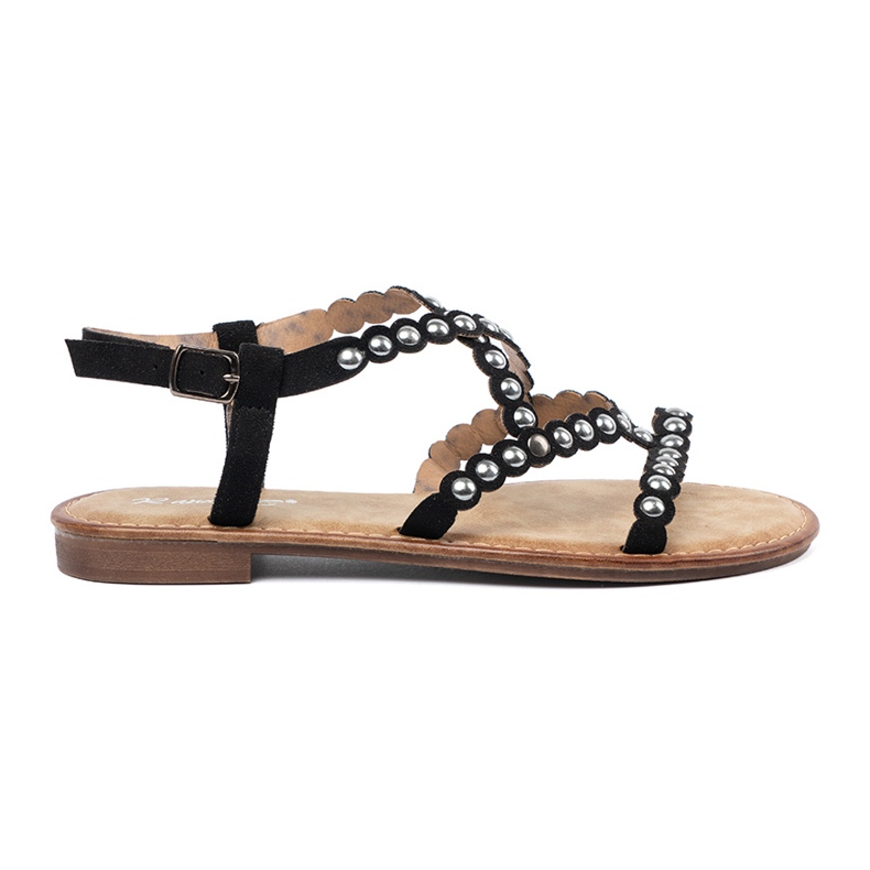 Sandalias negras decoradas con tachuelas negro