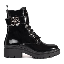 Botas barnizadas negras trabajadoras de mujeres negro