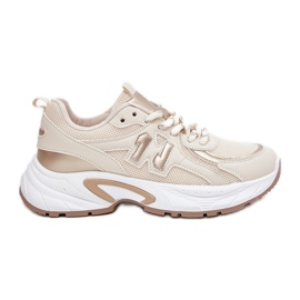 Zapatillas de deporte para mujeres en una suela beige masiva