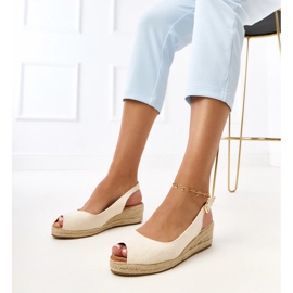 Sandalias beige alpartrilles en la cuña nevarez