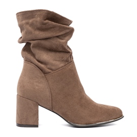 Shelvt Botas de gamuza de color beige oscuro en la publicación