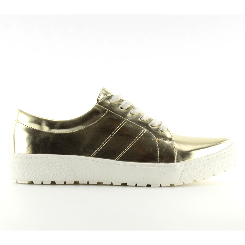 Mocasines para mujer en suela blanca. dorado
